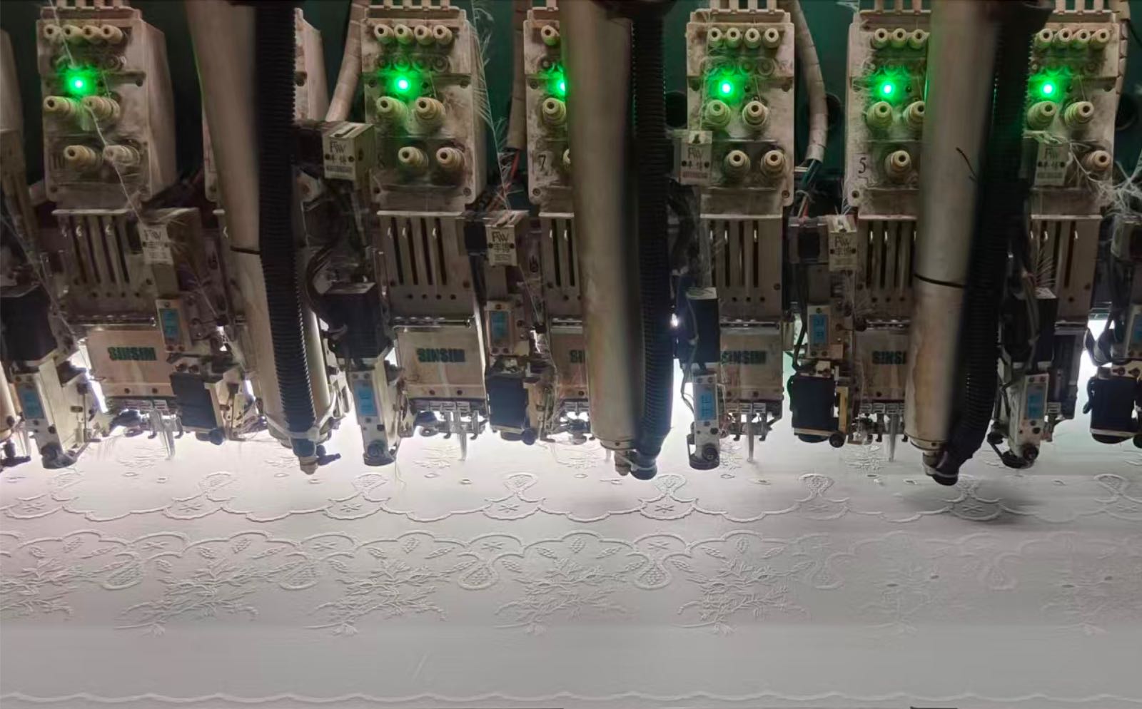 Embroidery machine with fabric detail