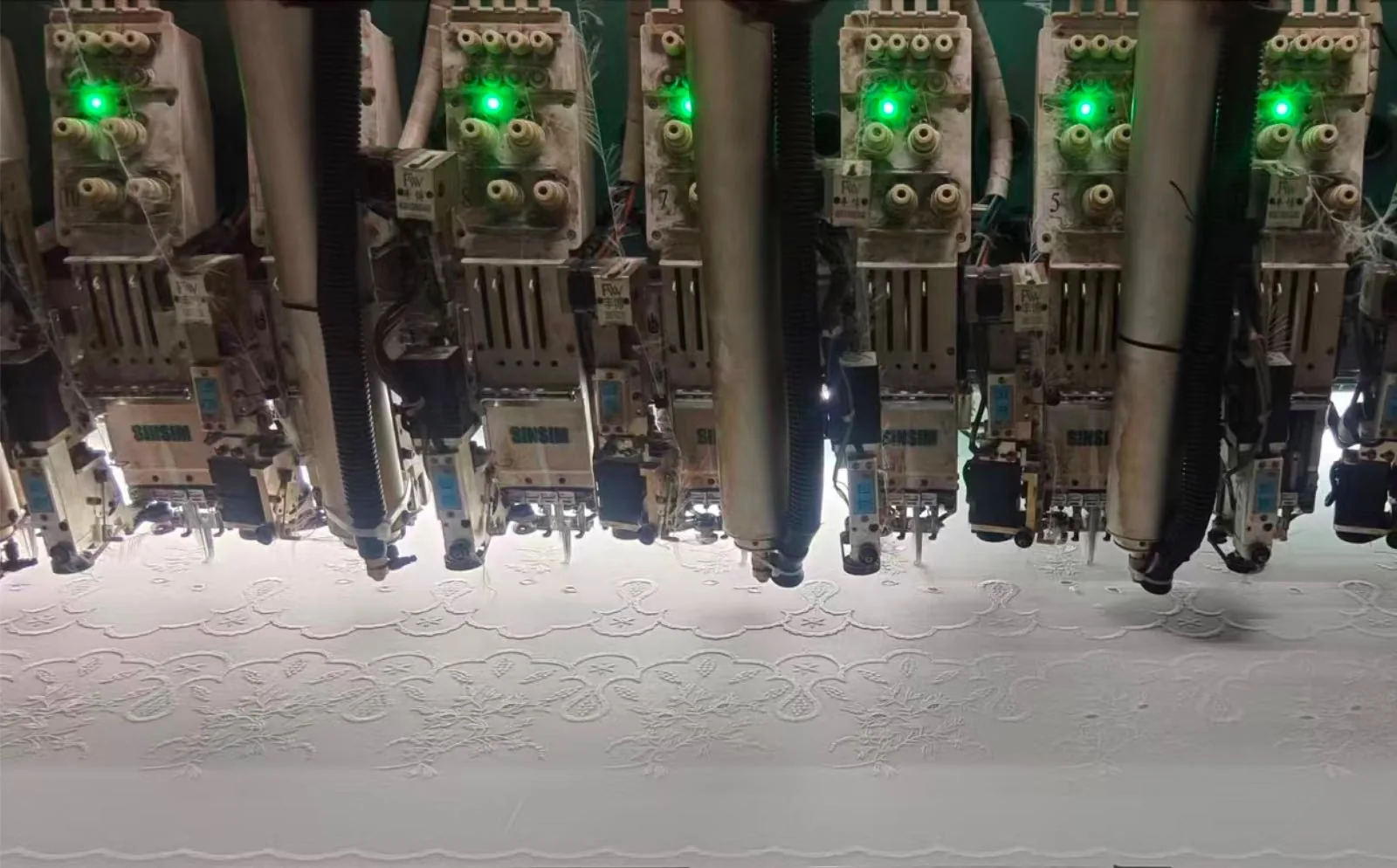 Embroidery machine with fabric detail